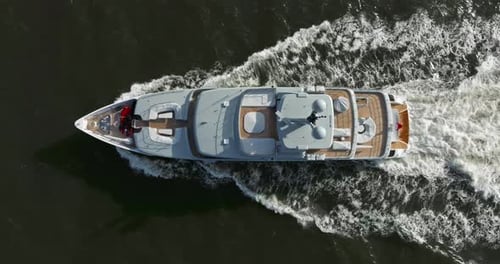 Aerial View Tracking of Beautiful Modern White Superyacht Lifestyle Luxury Boat Sailboat