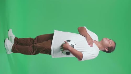 Full Body Of Asian Man With A Ball Putting Hand On His Heart To Respect On Green Screen