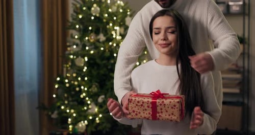 Woman Receives Christmas Gift From Loving Partner