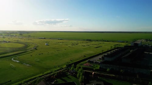 The Sun Sets on People Playing on an Outdoor Soccer Field Park in the Countryside of Winnipeg Manito