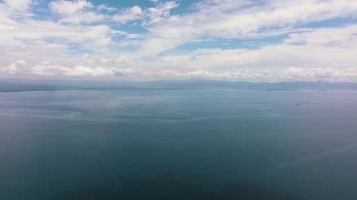Open Blue Ocean with Waves