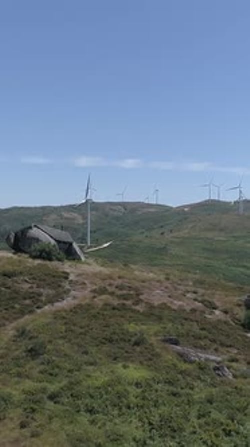 Vertical Video of Small Mountain House Aerial