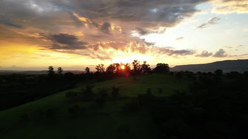 Golden Sunset Over Rural Landscape, Aerial View