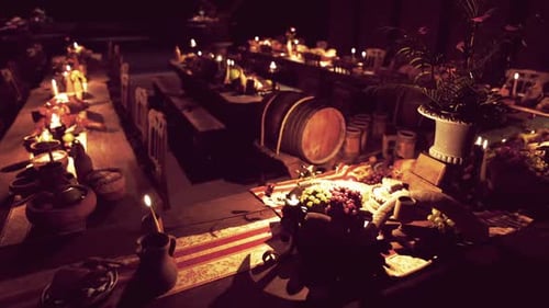 Candlelit Medieval Feast Hall Setting with Rustic Food and Barrels