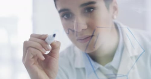 Science, innovation and woman in a lab writing data on a glass whiteboard with focus