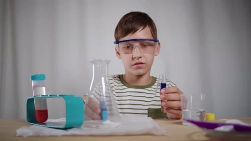 Boy Doing Science Experiment at Home