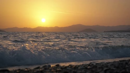 Dramatic Sunset Silhouette Under Sea
