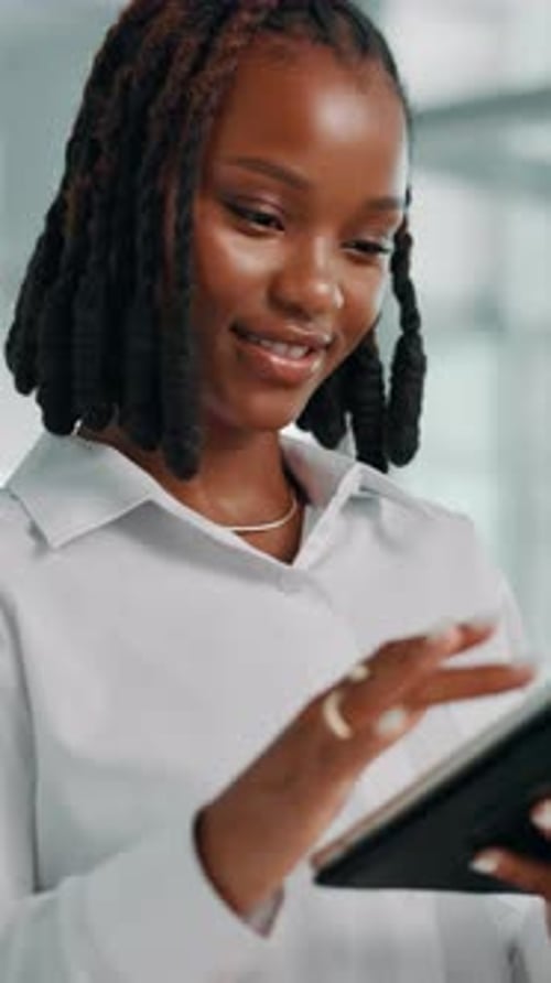 Black woman, tablet and scroll at startup, office or project management with review at media