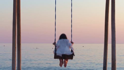 sunset swing on the beach