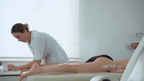 Procedure Feet Massage in Cabinet of Spa Salon