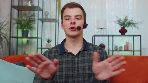 Young Man Freelance Worker Call Support Center Service Operator Helpline Having Talk with Client