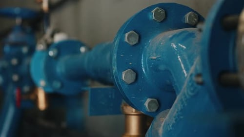 Industrial Water Pipeline with Bolted Flange Connection Close Up