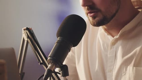 Bearded Guy Blogger Speaking Into Microphone in Slow Motion Close Up Caucasian Man Recording His