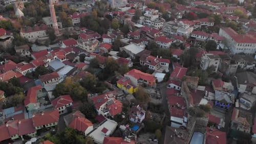 Morning Shot From a Quadrocopter Over a Town with Red Tiled Roofs on the Coast