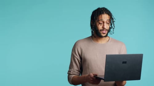 Happy Person Bonding with Mate Using Notebook to Hold Videoconference Studio