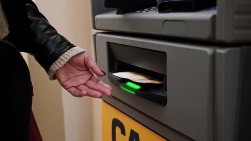 Stylish Woman Withdraws Euro Cash From Atm