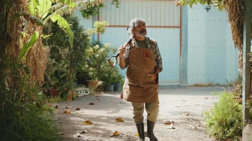 Man Gardening in Rural Setting