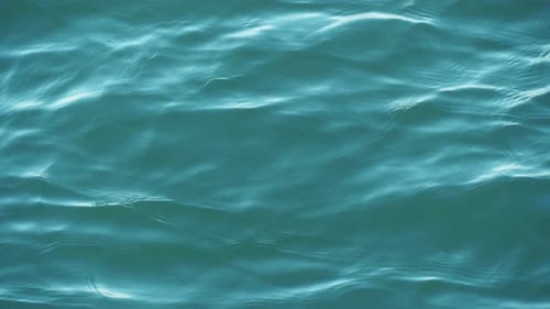 Water Surface with Ripples Reflecting Light