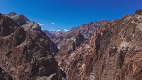Rugged Rocky Canyon with Sheer Cliffs From Drone