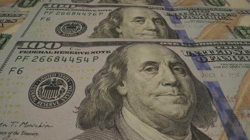 Close Up View Of Stacked One Hundred Dollar Bills