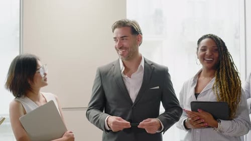 A Group of Diverse Professionals Collaborating in a Modern Office Setting for Success