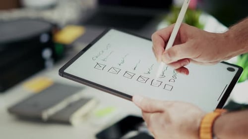 Completing Checklist with Stylus on Tablet Computer