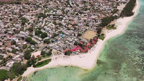 Dense Low Rise Buildings On The Coast Of The Resort Part Of Mauritius