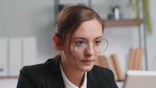 Closeup Businesswoman Freelancer at Office Workplace Works on Laptop Computer Sends Online Messages