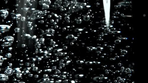 Air Bubbles in a Glass of Water Filmed on a Highspeed Camera at 1000 Fps