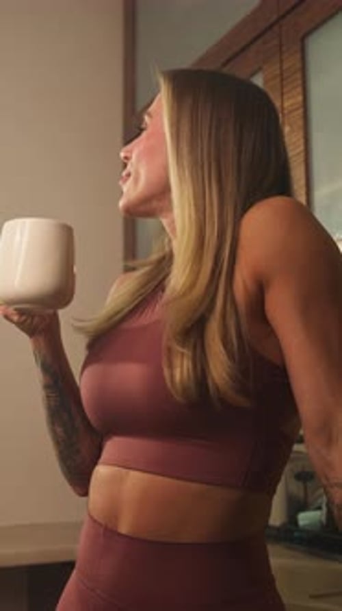 Woman Enjoying Warm Beverage Indoors Wellness Lifestyle