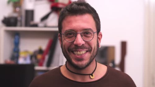 Smiling Man in Glasses Close-Up Portrait Indoors