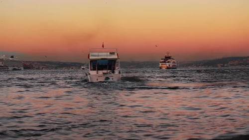 Boats Sailing on Water During Colorful Sunrise