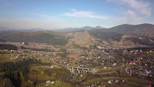 Aerial View of Autumn Mountain Landscape with Evergreen Pine Trees and Yellow Fall Forest with