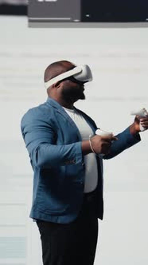 Vertical Video African American Programmer Engaging in Virtual Reality with a Headset