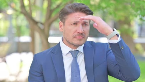 Man in Suit is Surprised, then Smiles