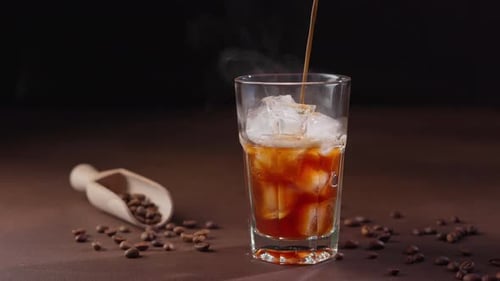 Coffee Poured Over Ice With Beans