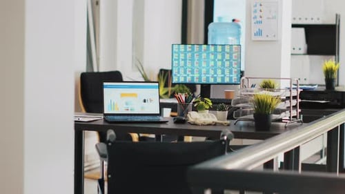 Bright Workplace with Computer and Wheelchair