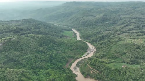 Aerial View of River Bend in Tropical Forest