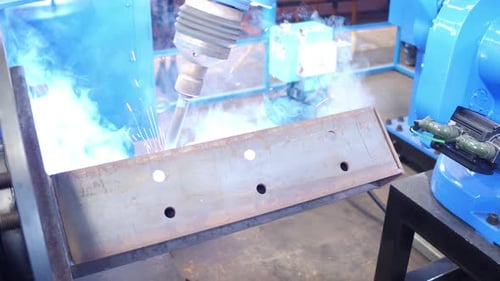 Iron Structure Being Fabricated By A Robotic Welding high angle