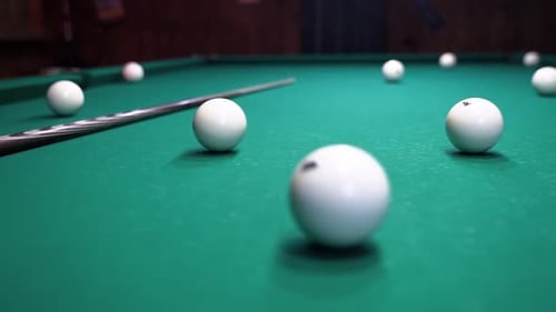 Billiard balls with numbers on a pool table
