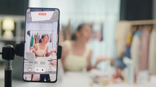 Woman Recording a Makeup Tutorial at Home