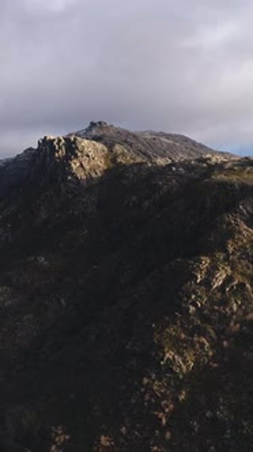 Vertical Video of Stunning Mountain Peak Aerial View