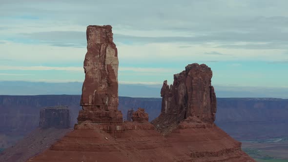 Towering Castleton Tower in Moab Utah’s vast desert landscape, an ...