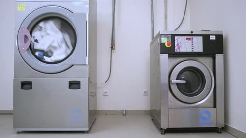 Industrial Washer Dryer Working. Hotel Laundry Service. Clothes Dryer Machine. Industrial Dryer