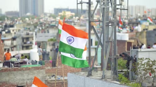 Indian Flags Waving on Rooftops in City
