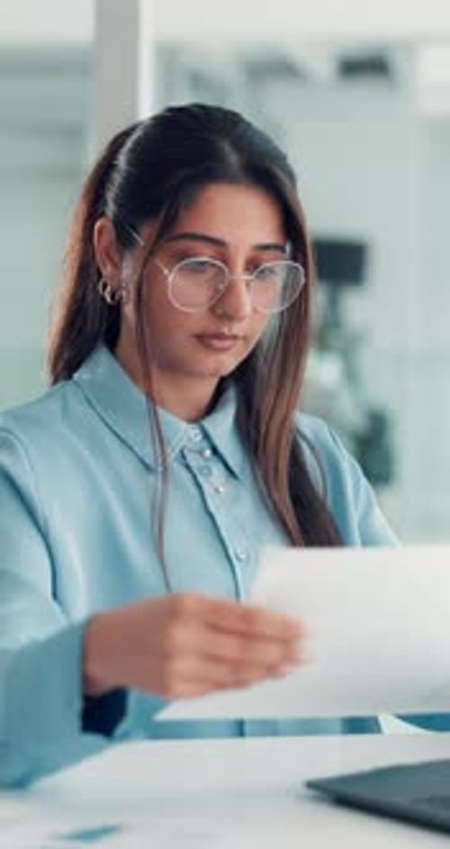 Business, woman and reading document in office for accounting, finance report and statistics