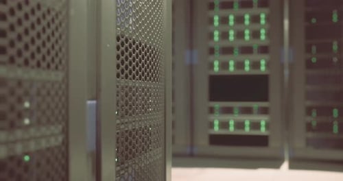 Modern Data Center Showcasing Rows of Server Racks with Glowing Indicators