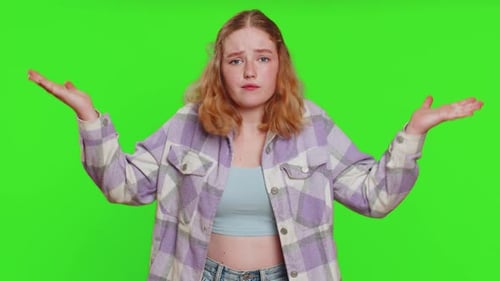 Expressive Woman Gesturing on Green Screen Background