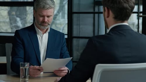 Caucasian Man Businessman Investor Client Reading Document Signing Contract Men Business Partners