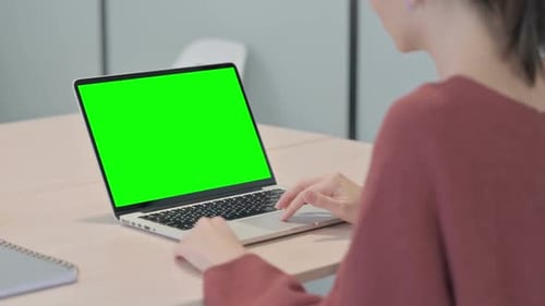 Close up of Beautiful Woman Using Laptop with Green Screen